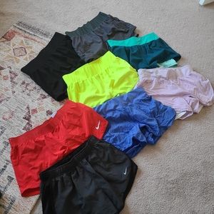 8 pairs fabletics & nike shorts size medium